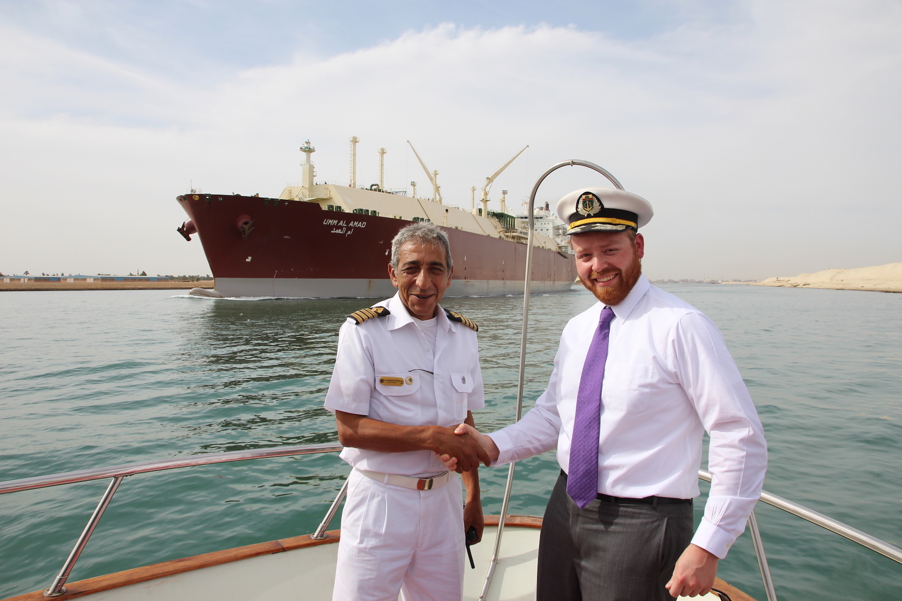 Shaking hands with the captain on the bow of the Egyptian Presidential Yacht on the Suez Canal