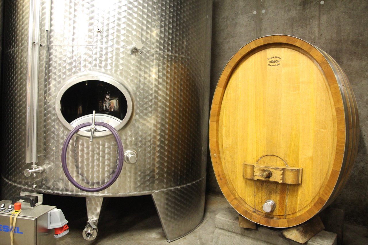 Modern and vintage wine fermentation casks
