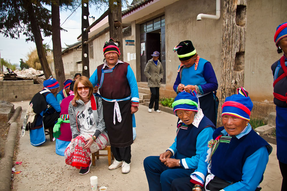 Aniko Villalba visits with inhabitants of a small village in China.