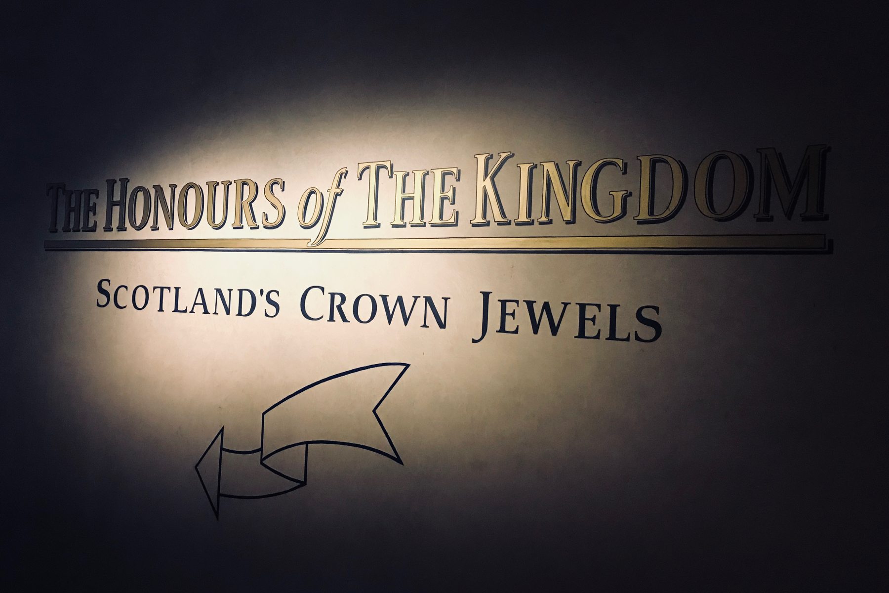 A photo of the sign leading to The Honours of The Kingdom Exhibit at Edinburgh Castle