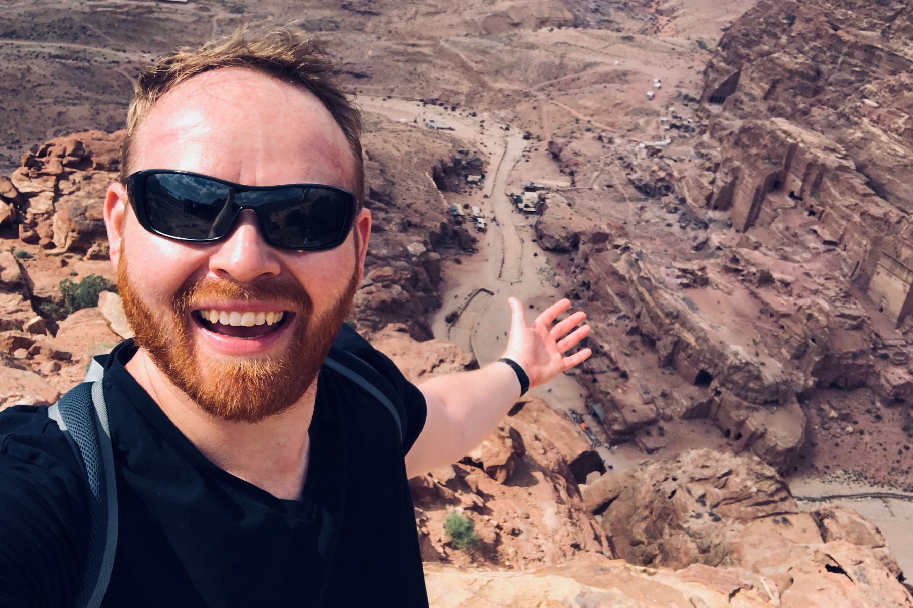 A selfie with The Royal Tombs of Petra, taken from atop the High Place of Sacrifice